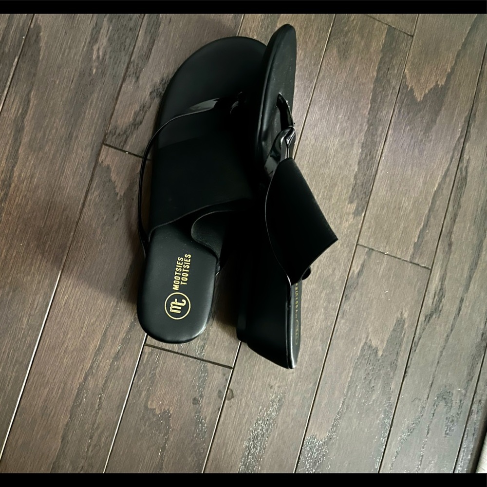 Size 9/ Newly Used / All Black / Slight Heel